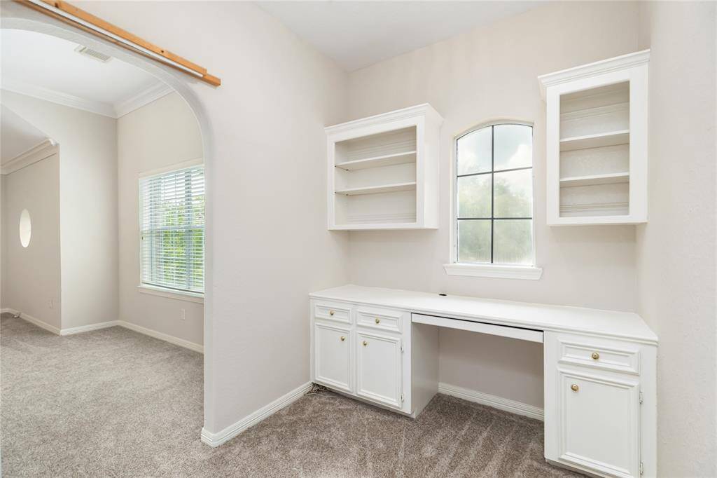 Just off the game room is a study- the perfect quiet spot for homework or a desktop computer, but you could also use this as a craft space
