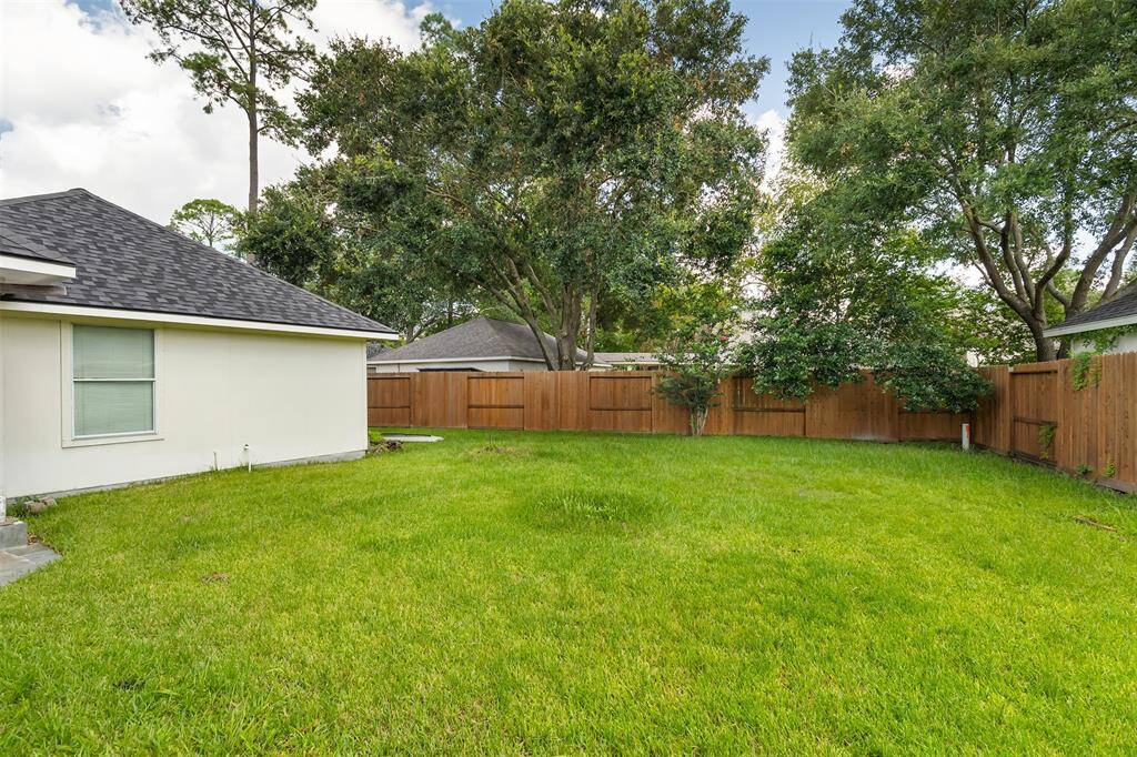The recently replaced fence is secure enough to keep your kids and pets contained