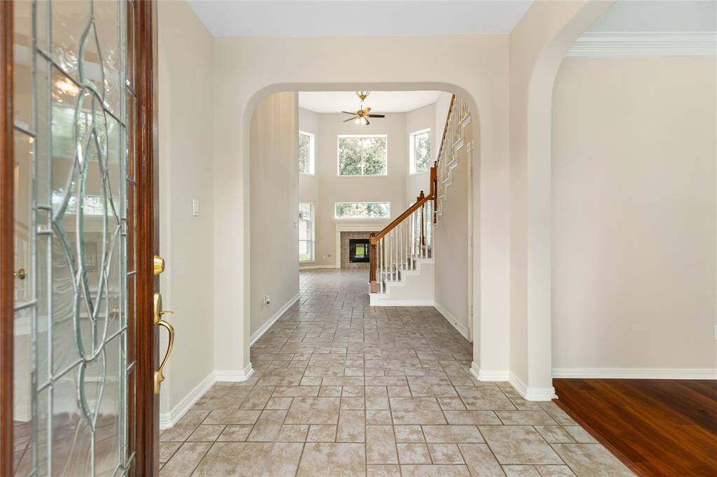 Greet guests into your new home through the leaded glass front door.