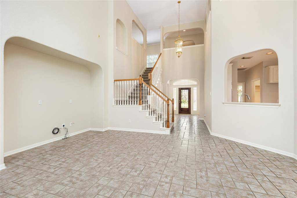 The cutout in the wall is designed to frame your entertainment system, and mimics the arched cutouts and doorways throughout the home