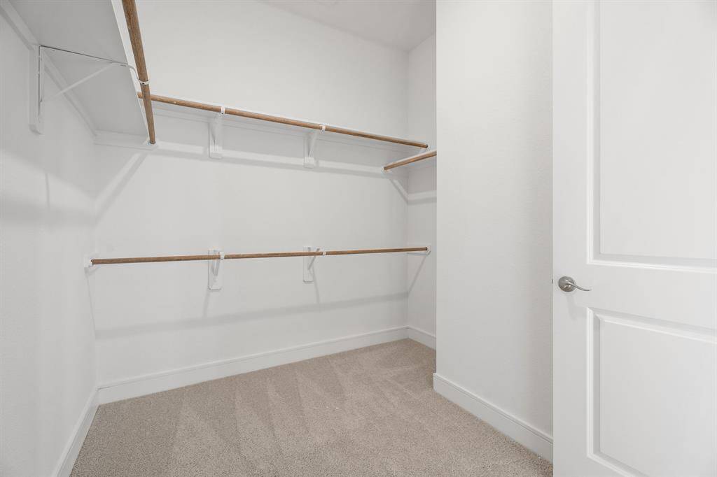 Huge walk-in closet in the primary suite