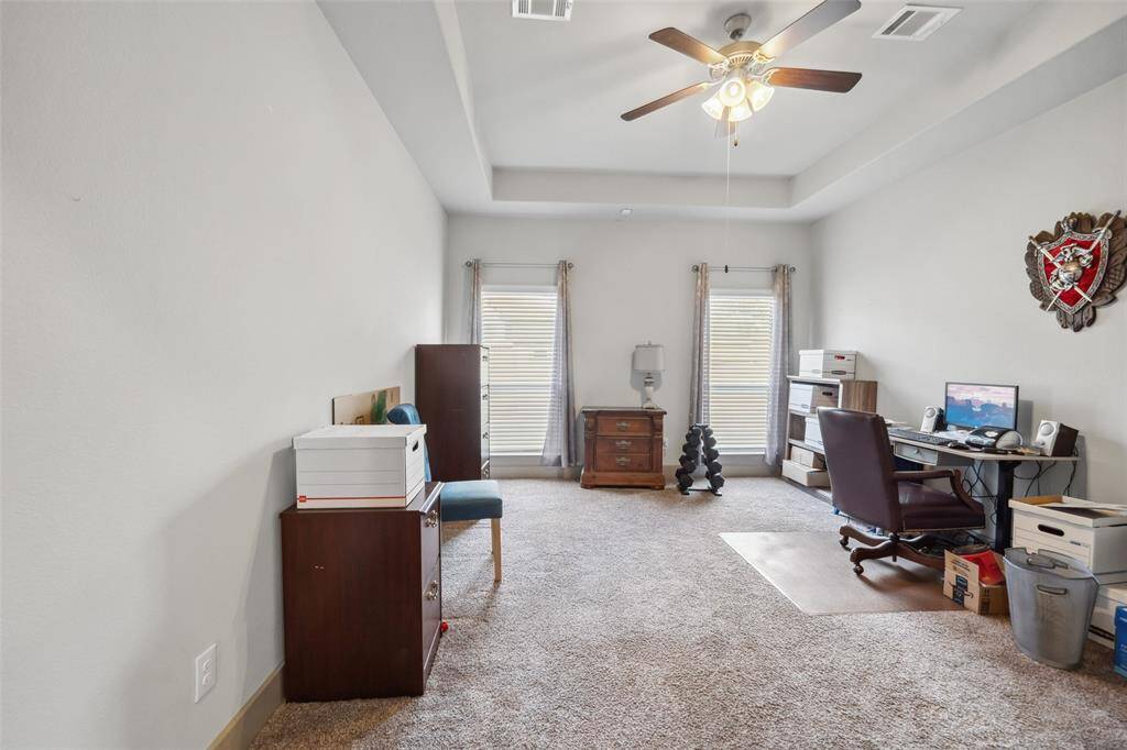 Office with glass french doors. Also has a closet could be a fourth bedroom.