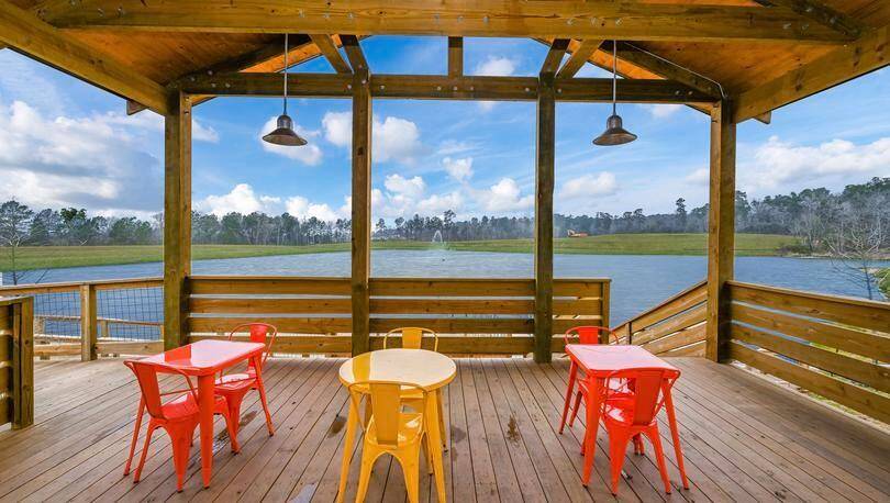 At the Wedgewood Cove Fish Camp, residents have access to a charming, lakeside cabin that has a covered deck, floating pier, and fish-stocked lake. Spend an afternoon fishing with your family or take an evening stroll along the paved walking path surrounding the lake. Adjacent to the Fish Camp is the enchanting Butterfly Park that includes a playground, picnic benches, covered seating, and a tennis court.