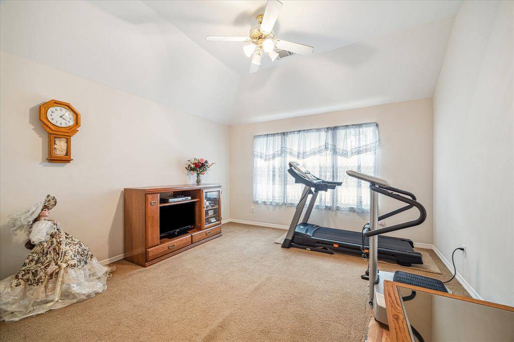 Bedroom #3 on the second floor offers cozy comfort as the only room with plush carpet.