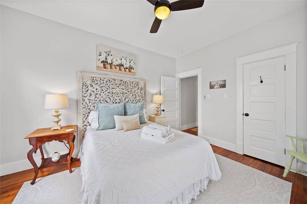 This room has a queen bed, 2 night stands, dresser, and chair.  This room could easily accommodate a king size bed.