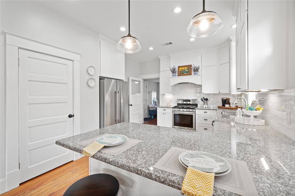 Sleek Stainless Steel Appliances and Large Pantry!