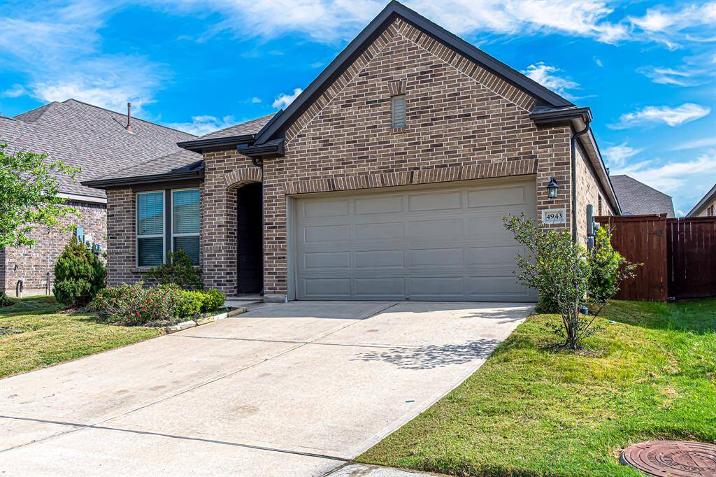 Charming single-story brick home with a two-car garage and a neatly landscaped front yard. Features a welcoming entrance with large windows, providing ample natural light. Ideal for comfortable family living.
