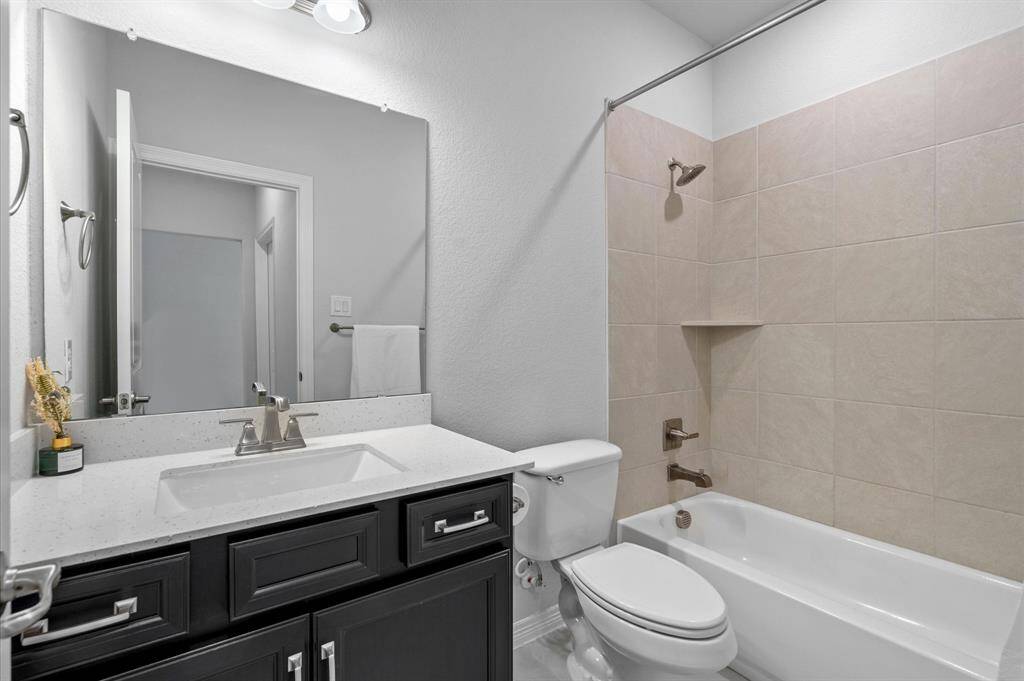 Secondary Full Bath located on first floor.