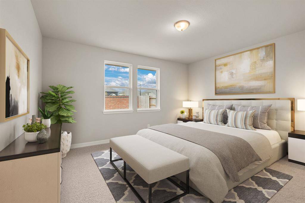 The primary bedroom is generously sized, creating a tranquil and spacious retreat that offers ample room for relaxation. Featuring plush carpet, high ceilings, fresh paint, and large windows that lets in natural lighting throughout the day.