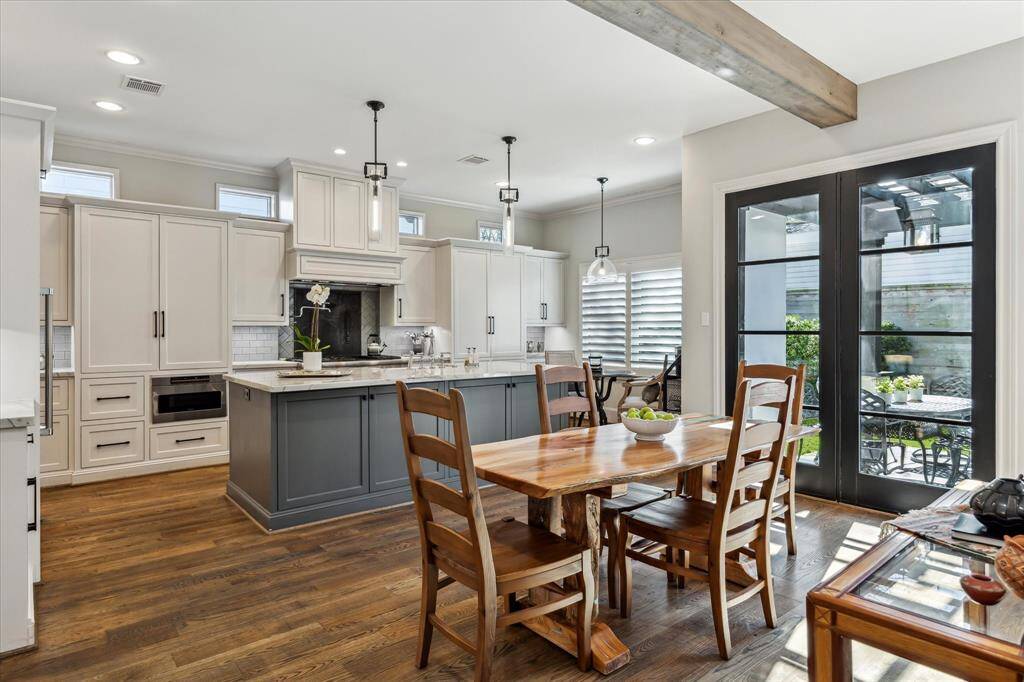 The Kitchen is wonderfully open to the Den.