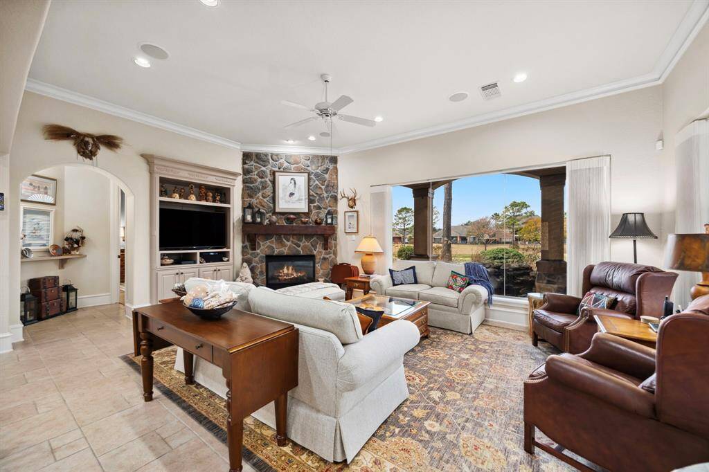 At the rear of the home is the main living offering views of the golf course and back patio.