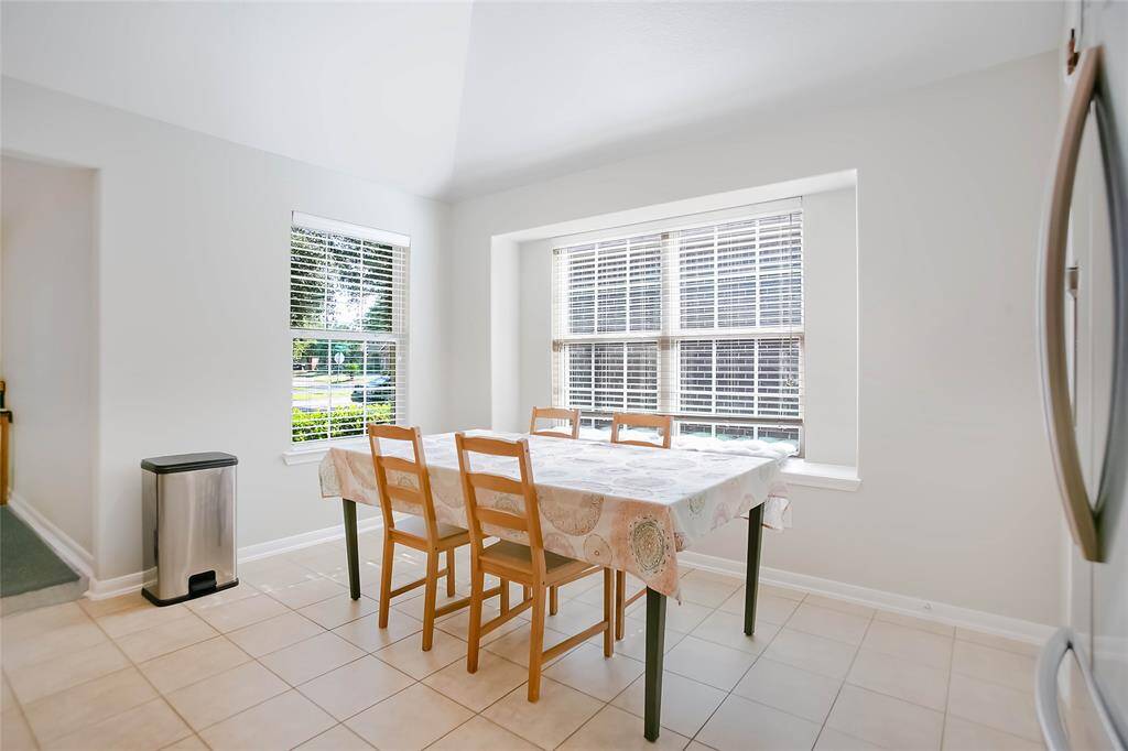 Adjacent to the entryway, the formal dining room provides additional space for meals and is perfect for hosting guests.