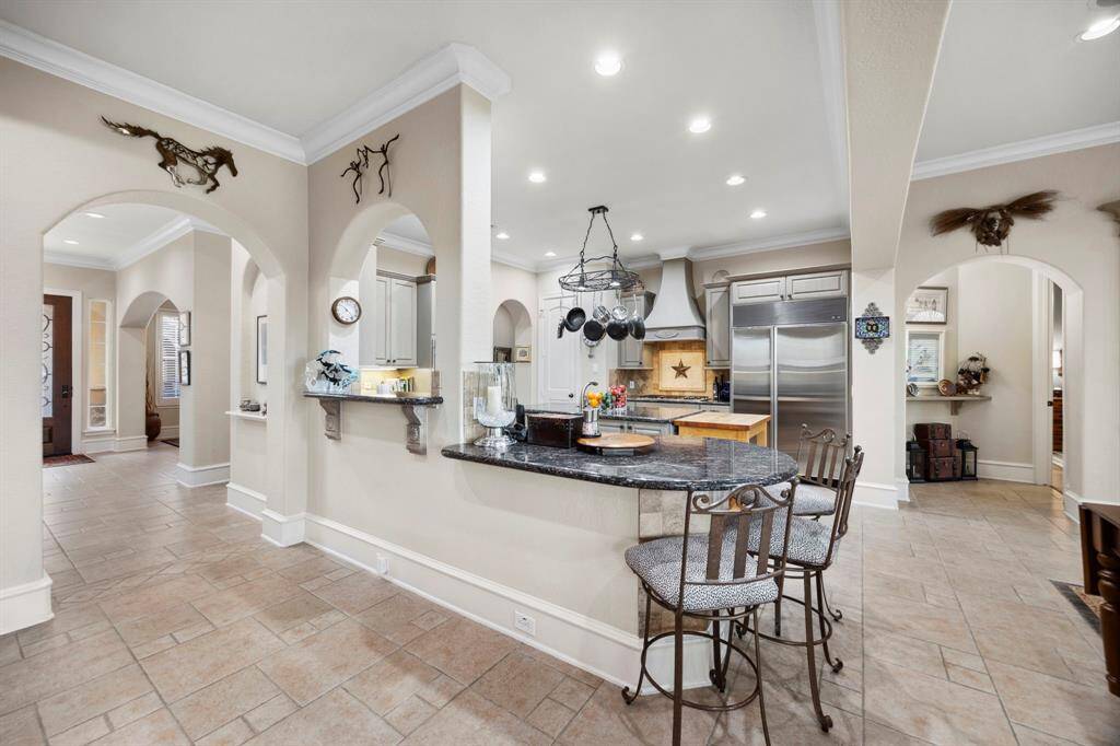 A view of the kitchen from the breakfast area.