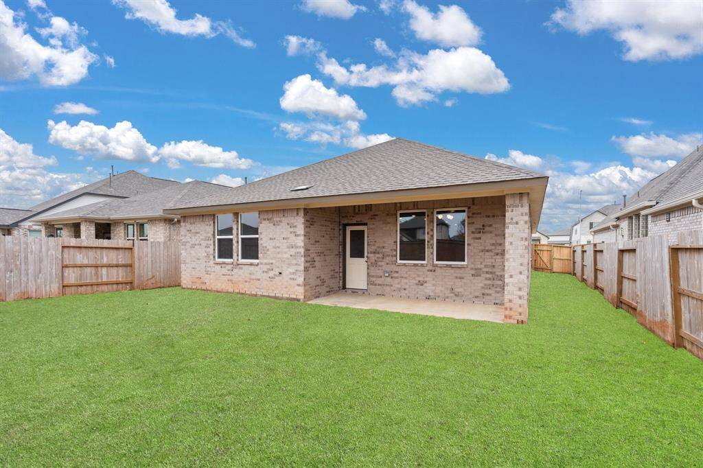 This backyard is perfect for family gatherings, social events, or simply unwinding in the fresh air.