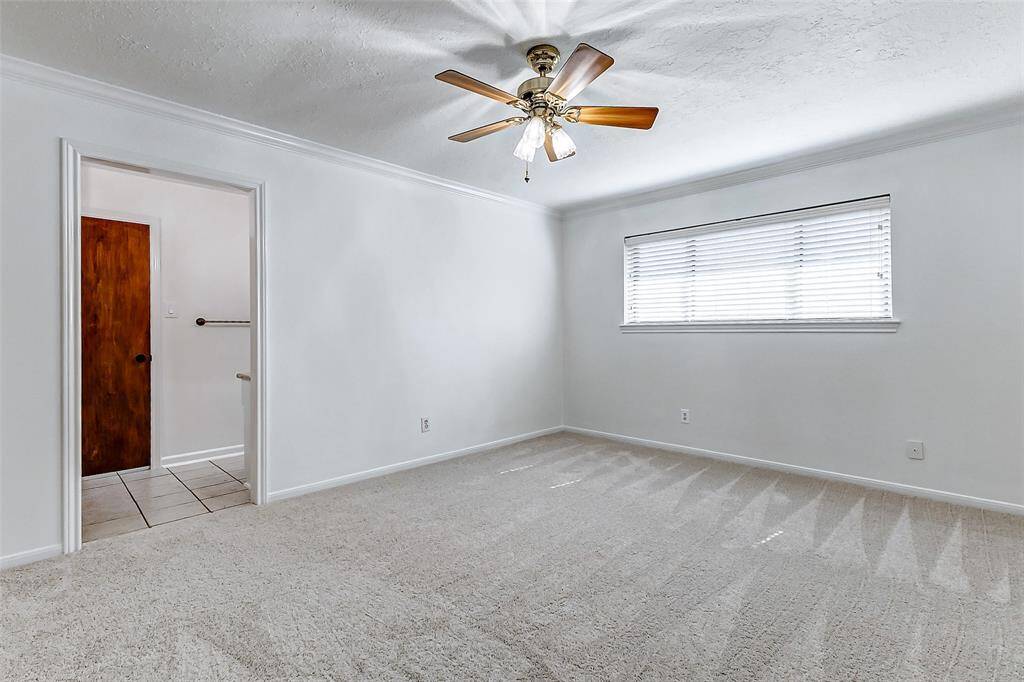 Beneath your feet, newly installed plush carpeting creates a soft and welcoming surface, providing a cozy foundation for your sanctuary. The wide window lets natural light pour in, brightening the room and enhancing the peaceful atmosphere of this restful retreat.