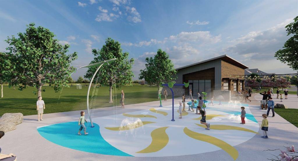 Relax as your kids enjoy a warm afternoon at the splash pad.