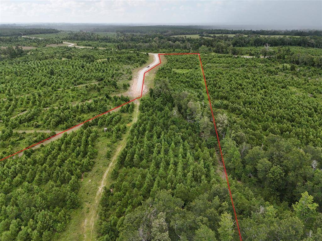 Aerial view of property. Boundary lines are approximate, please verify.