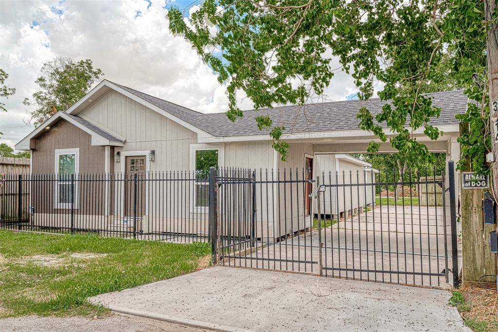 completely redone home. CHECK OUT THE LONG DRIVEWAY AND CARPORT