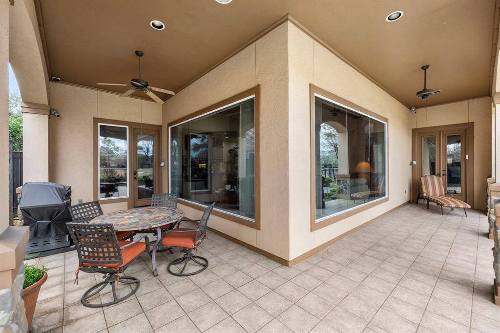 Just outside the breakfast area is the door to the spacious back patio overlooking the 5th fairway.