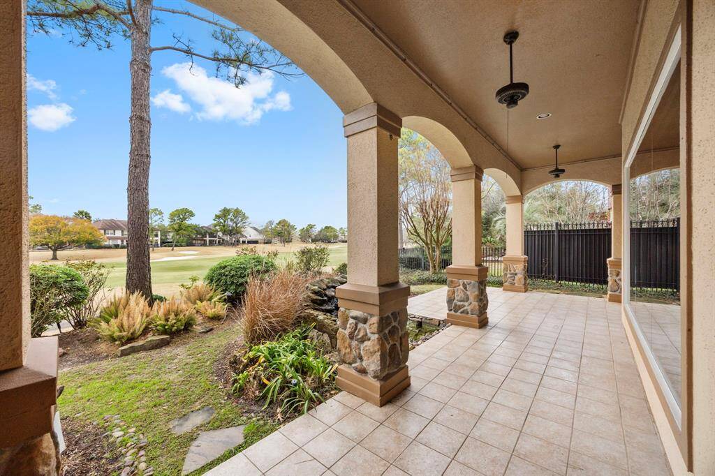 The covered porch wraps around the back of the home offering additional enjoyable outdoor space.