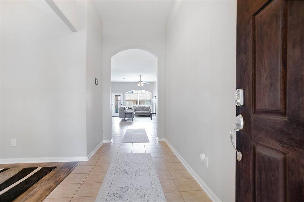 Recently updated with fresh two-tone interior paint, this home boasts an open and inviting atmosphere.