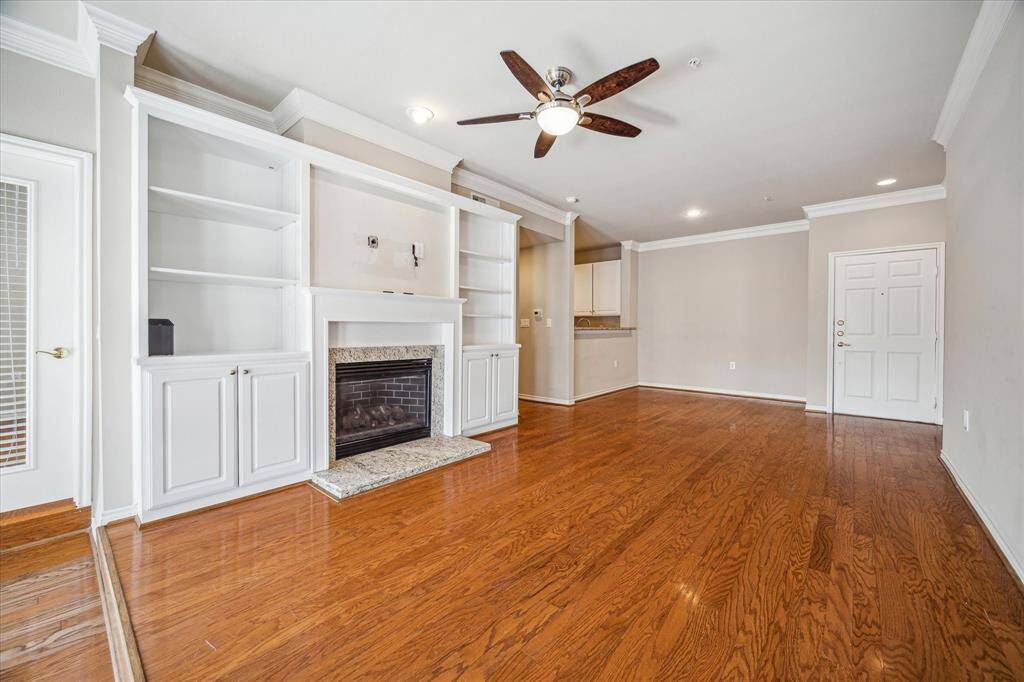 Open living room w/ fireplace