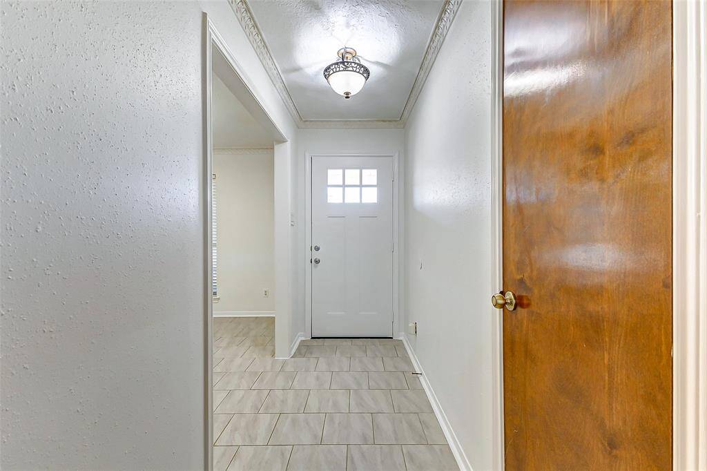 As you step inside, a sense of space and sophistication greets you. Neutral tile floors provide a seamless flow throughout the main living areas, while fresh decorator paint and soaring ceilings with elegant crown molding enhance the home's bright and airy ambiance. Please note: you also have an ApcoOne UVC light with carbon technology installed in the home.