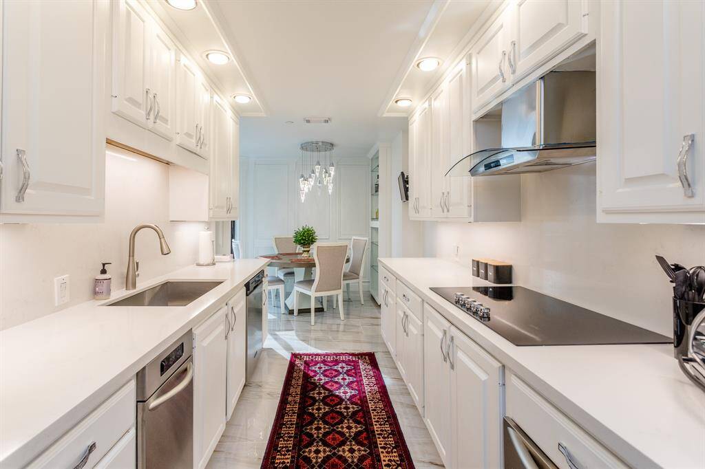 Updated kitchen with quartz counters and back splash