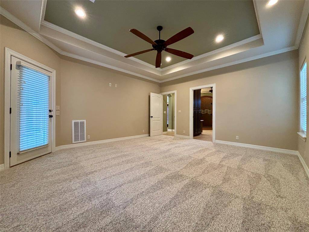 Easily access the back patio from your master retreat for convenience and privacy while enjoying your backyard oasis!