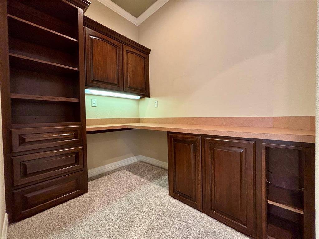 Custom desk area located inside 2nd bedroom.