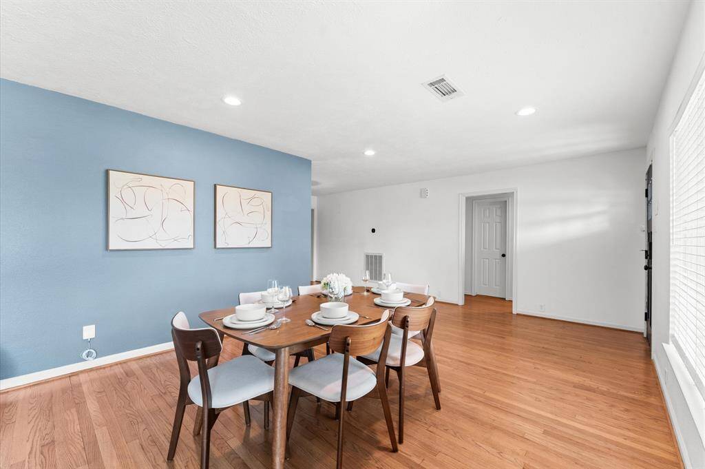 Beautiful, original hardwood floors are found throughout most of the home. Enjoy an open concept floorplan with functional, defined living spaces.