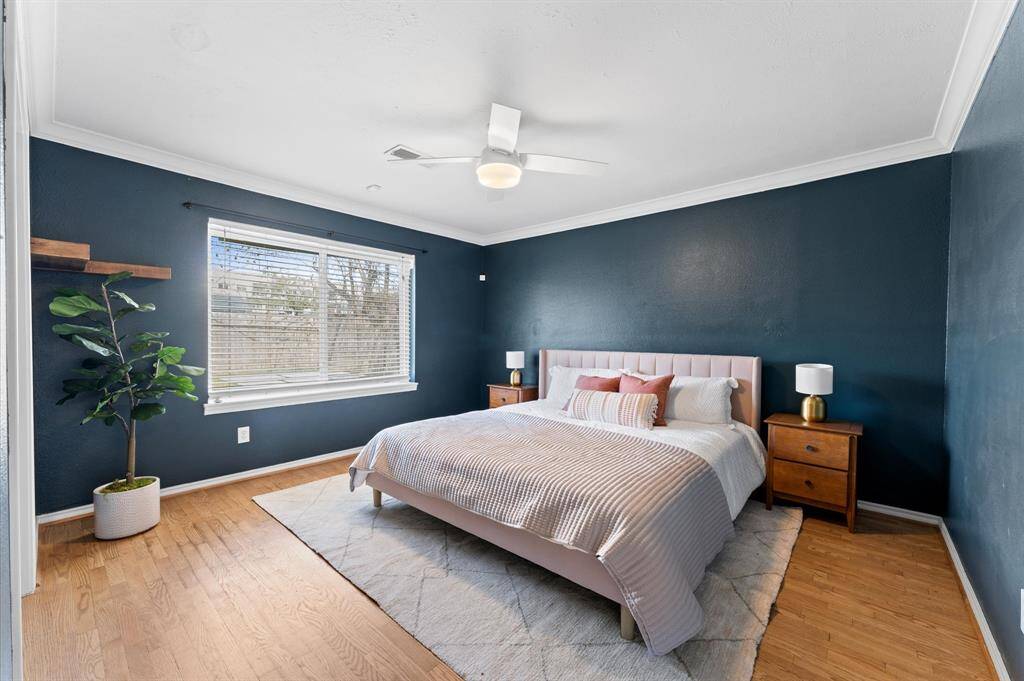 The primary bedroom is a cozy sanctuary.