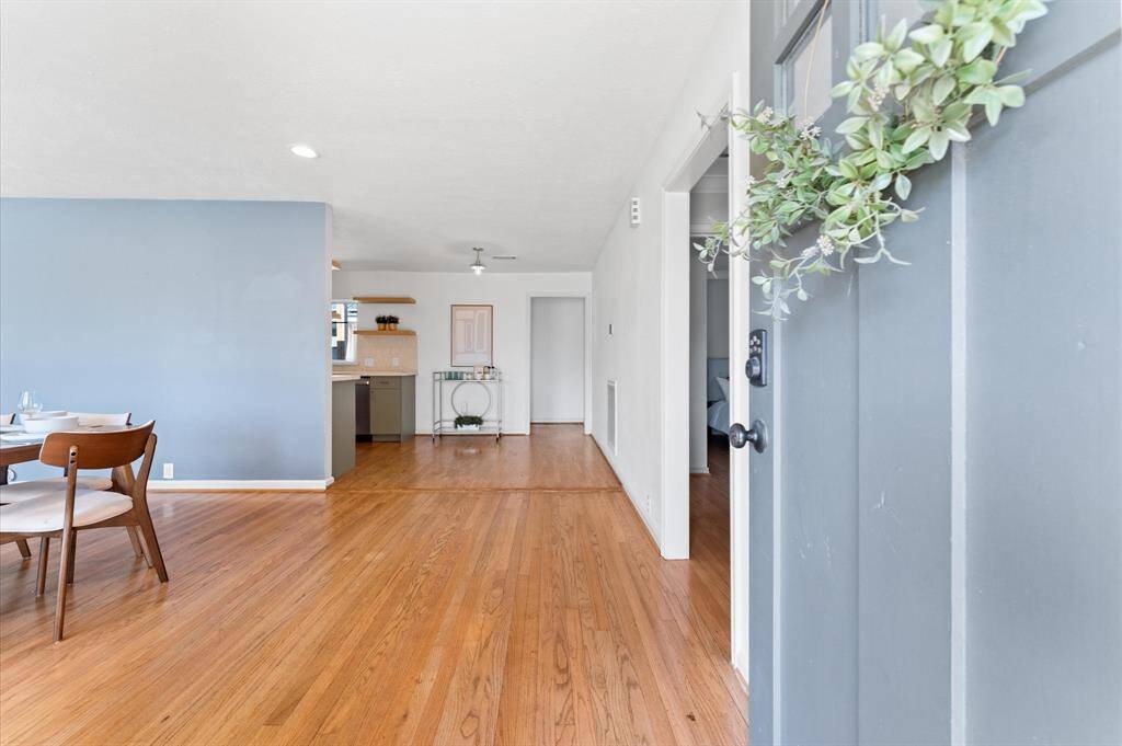 Beautiful, original hardwood floors are found throughout most of the home. Enjoy an open concept floorplan with functional, defined living spaces.