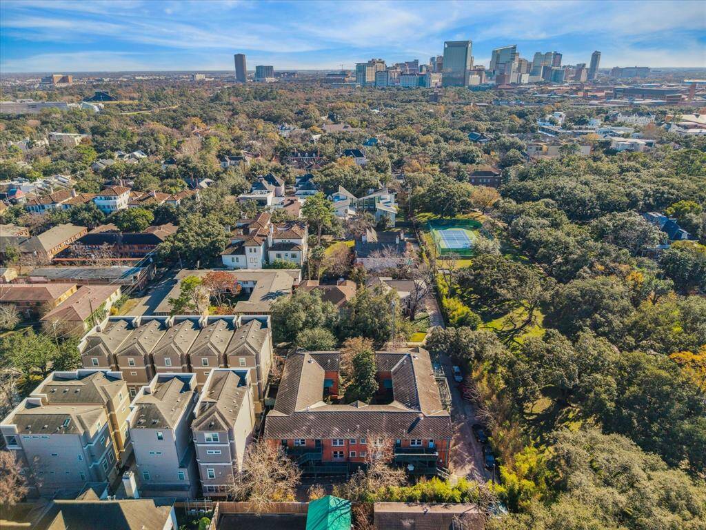 View facing The Medical Center, Hermann Park and Rice University with a private park and North & South Blvd's live oaks to the right.