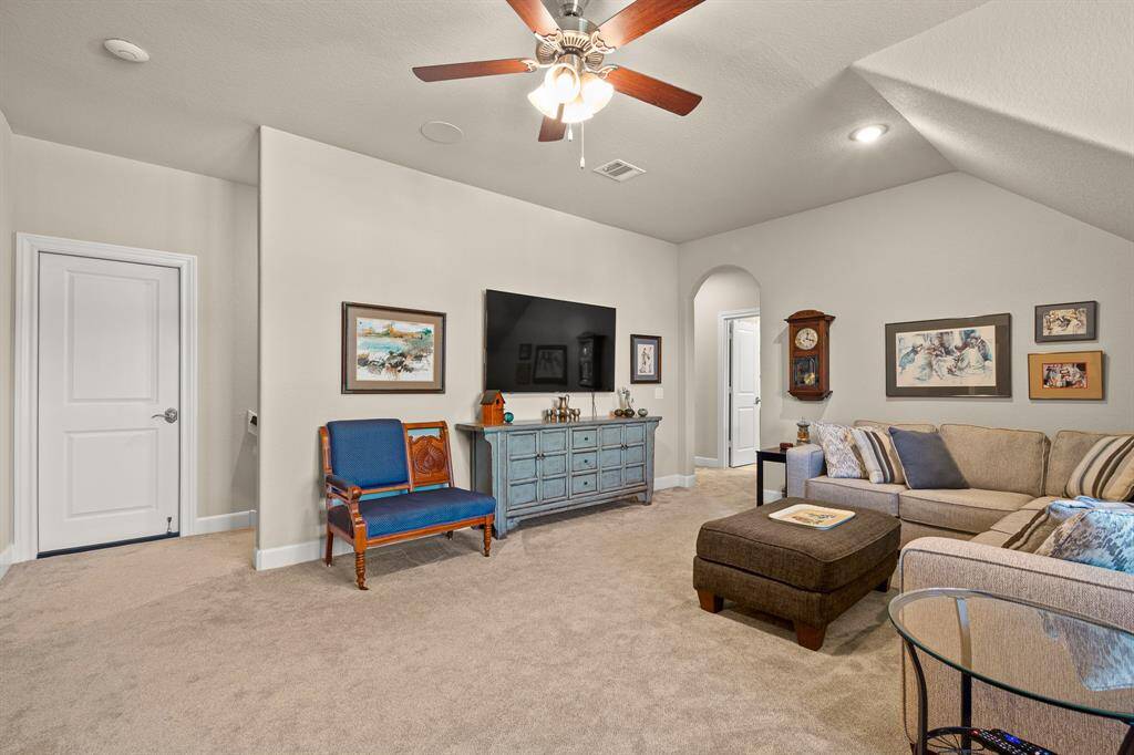 Step into the secondary Living/Gameroom has elegant recessed lighting. Enjoy entertaining or just relaxing. Your 3rd Bedroom en-suite is just around the corner.