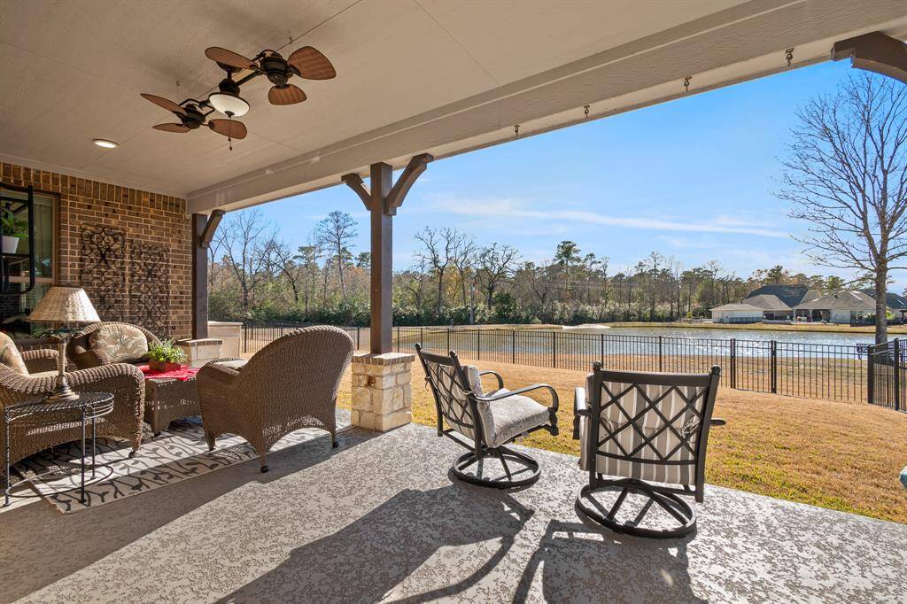 This inviting Patio overlooks a serene Community Lake and spacious backyard. Ideal for relaxation and enjoying your views of the sunsets.