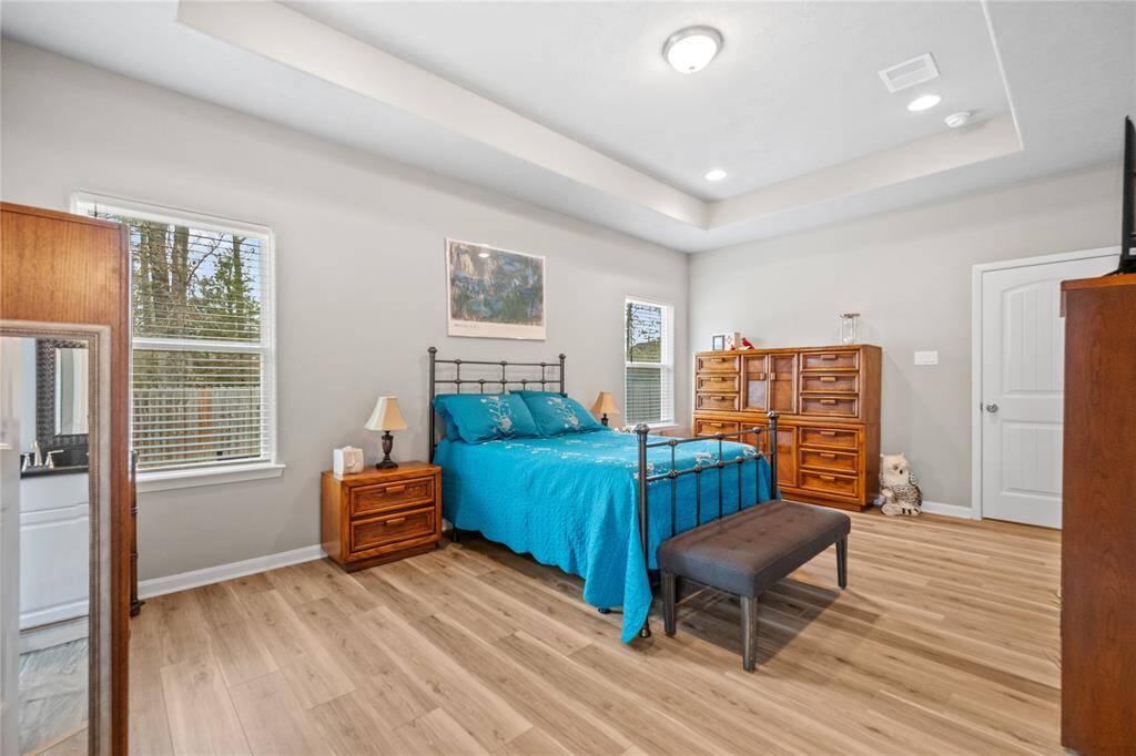 Primary bedroom offers a large walk-in closet