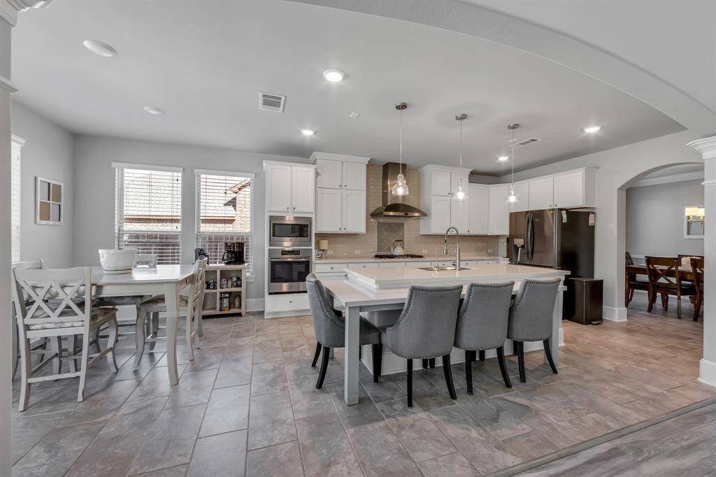 Open concept is so welcoming with lots of seating for all.