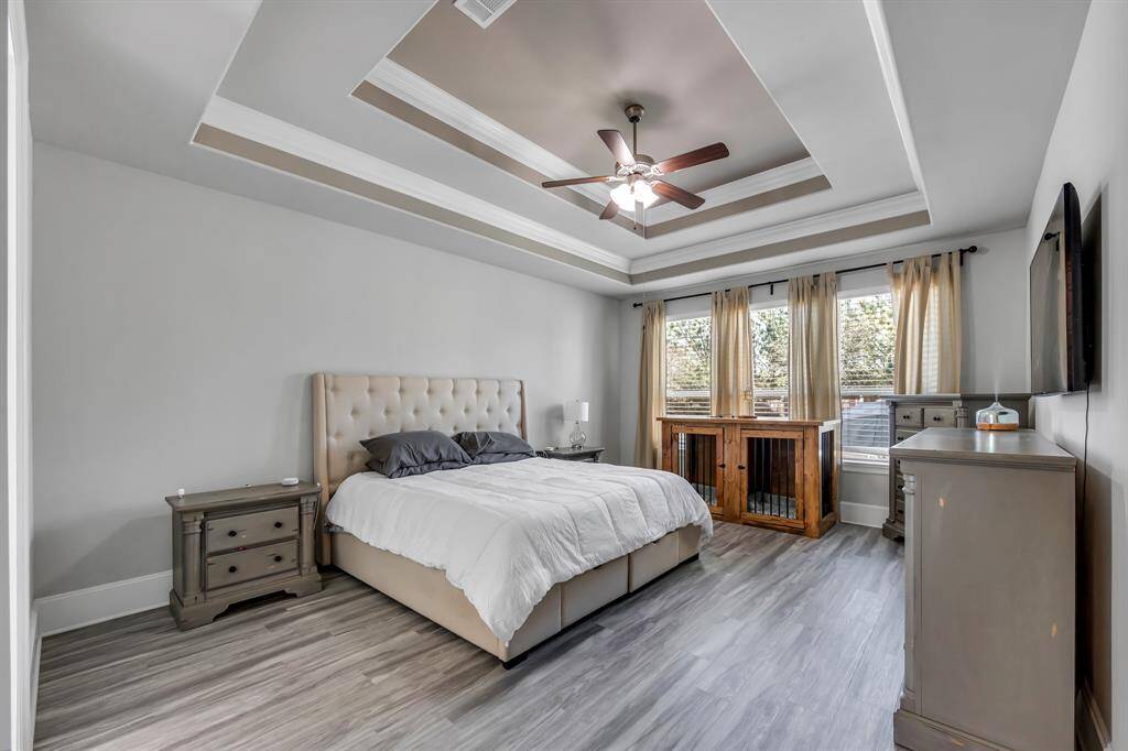 Primary Suite has tray ceilings, new LVP floors and all the space you need to relax and unwind.