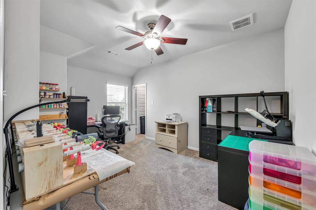 Bedroom 4 has ceiling fan, carpet, large closet and bathroom has shower and tub combo.