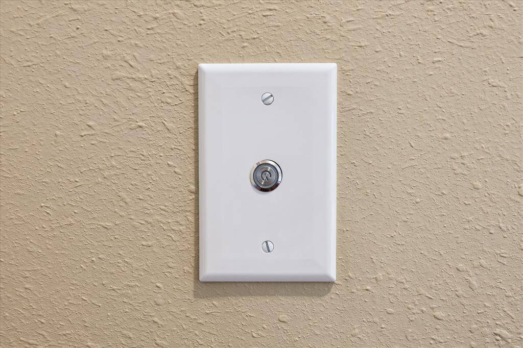 Throughout the home, you will see these sleek, custom, push-button light switches--super cool!