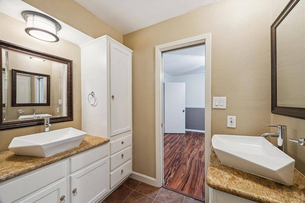 .Double ovens???  YES! (There are 3 ovens total in the home) Plus, granite countertops, glass front cabinets, and access to the garage.  Incredible laundry room.