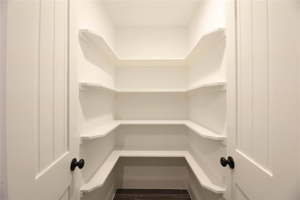 Walk-in pantry w/ abundant shelving!