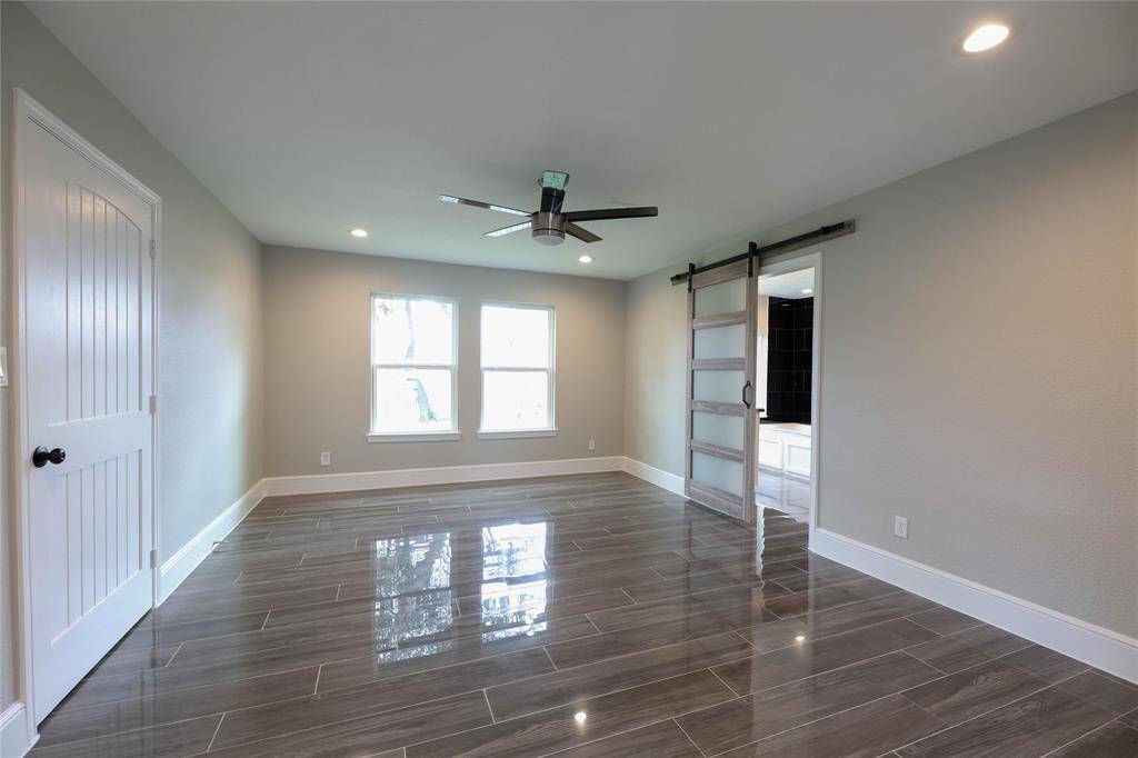 Primary Bedroom offers a walk-in closet, dual vanities, soak tub & separate walk-in shower.