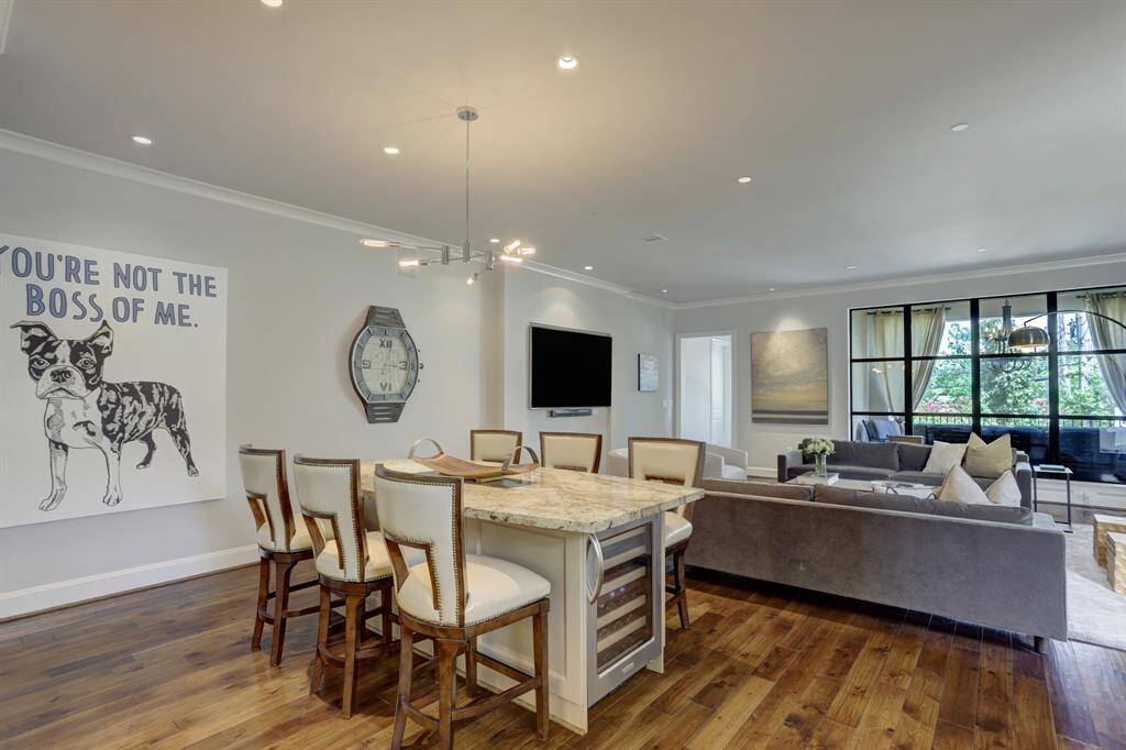 Another view from the kitchen into the living room that showcases the open concept living.