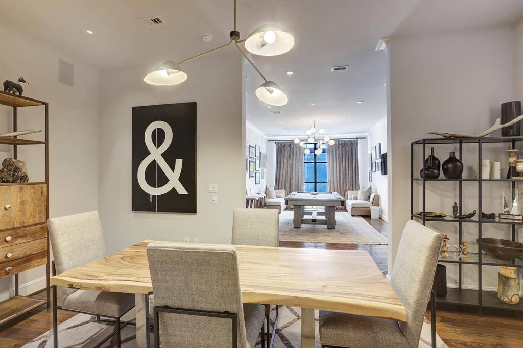 A view from the dining room into the game room.