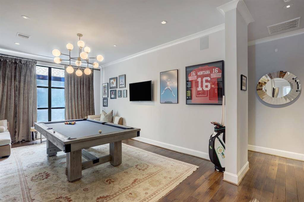 This area features plenty of natural light and access to one of the three balconies.
