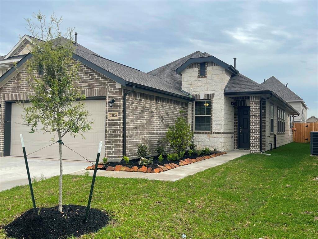 One story home with 3 bedrooms, 2 baths, and 2 car garage.