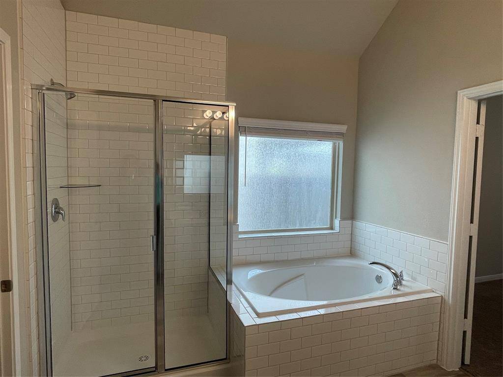 Soaker tub and shower in owner's bath