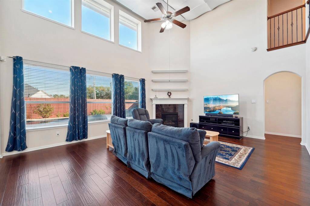 Notice the soaring, second level ceilings here.